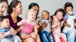 image of mothers holding babies